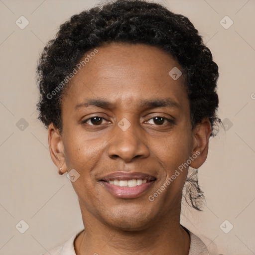 Joyful black young-adult male with short  brown hair and brown eyes