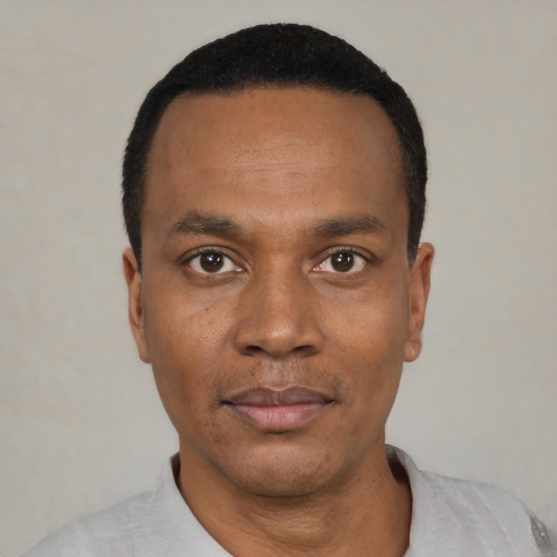 Neutral black young-adult male with short  black hair and brown eyes