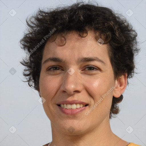 Joyful white adult female with short  brown hair and brown eyes