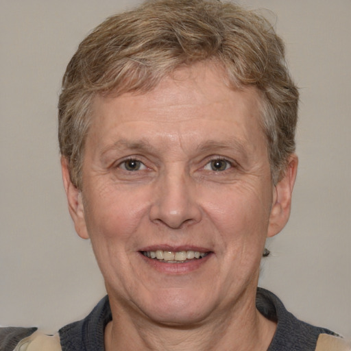 Joyful white middle-aged male with short  brown hair and brown eyes