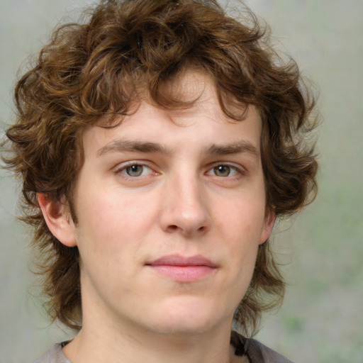 Neutral white young-adult male with medium  brown hair and grey eyes