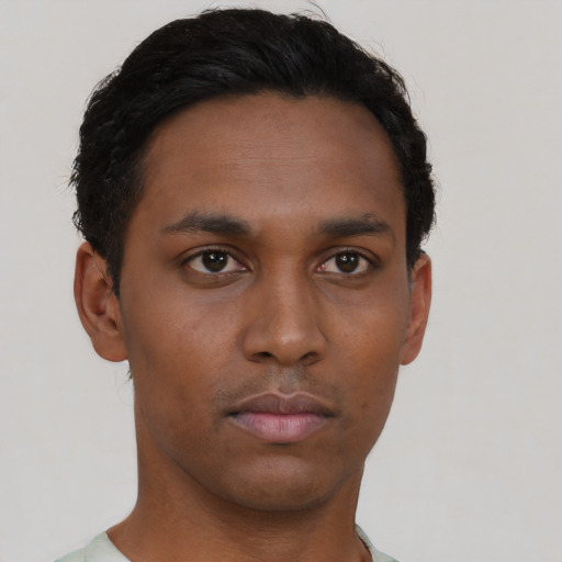 Neutral black young-adult male with short  black hair and brown eyes