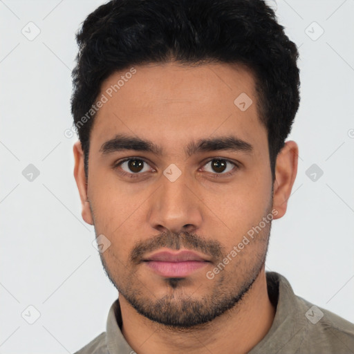 Neutral latino young-adult male with short  black hair and brown eyes