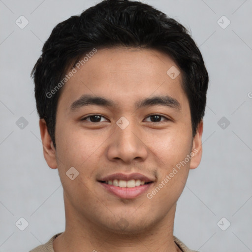 Joyful asian young-adult male with short  black hair and brown eyes