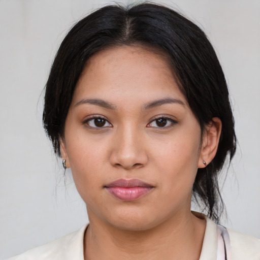 Neutral asian young-adult female with medium  black hair and brown eyes