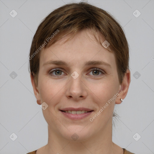 Joyful white young-adult female with short  brown hair and grey eyes