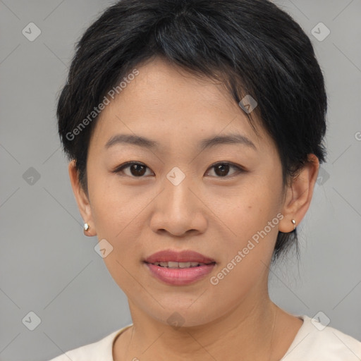 Joyful asian young-adult female with short  brown hair and brown eyes