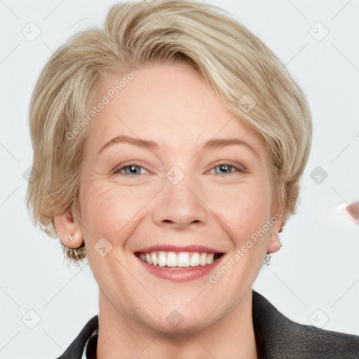 Joyful white adult female with medium  brown hair and blue eyes