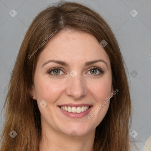 Joyful white young-adult female with long  brown hair and green eyes