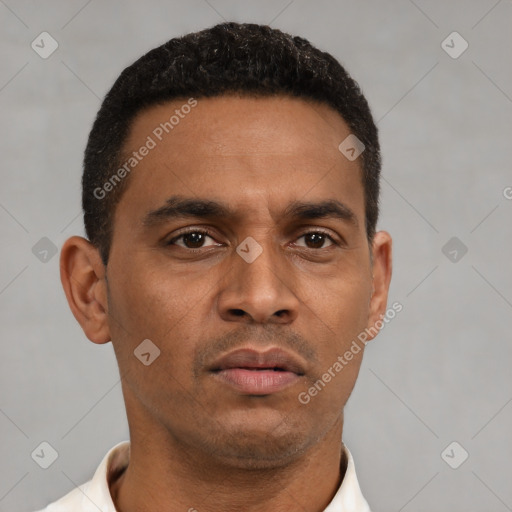 Neutral latino young-adult male with short  black hair and brown eyes