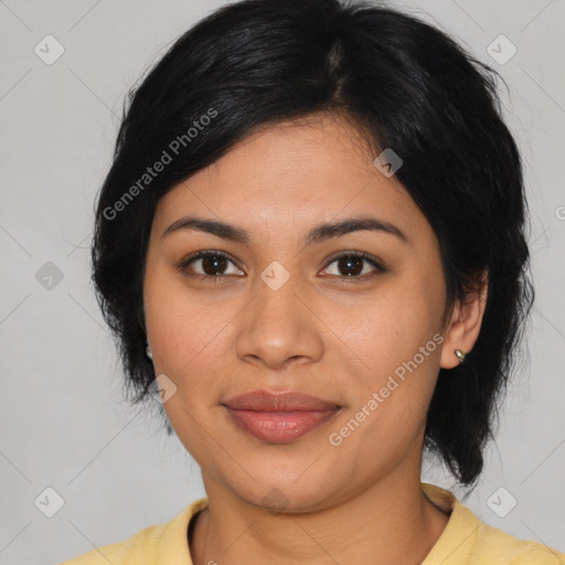 Joyful latino young-adult female with medium  black hair and brown eyes