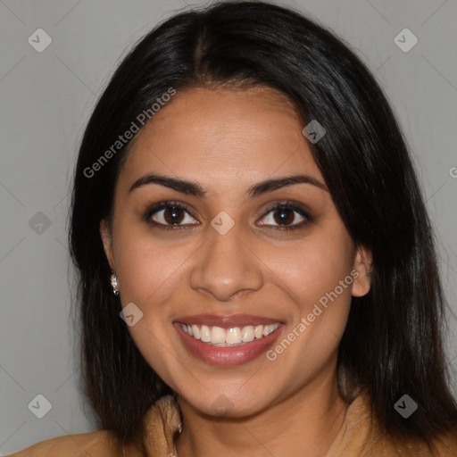 Joyful latino young-adult female with long  brown hair and brown eyes