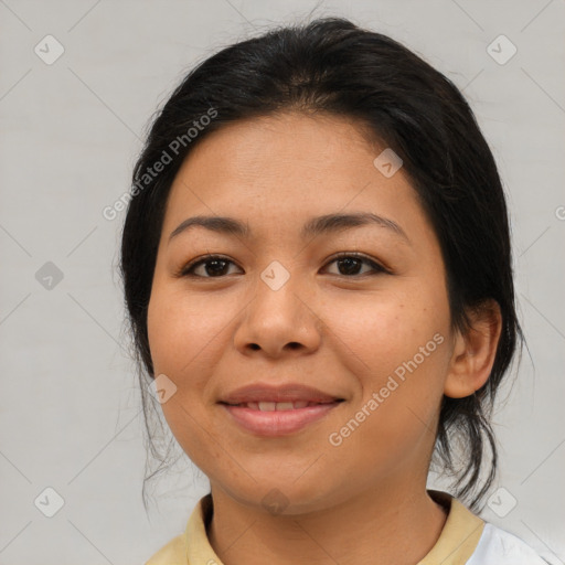 Joyful asian young-adult female with medium  brown hair and brown eyes