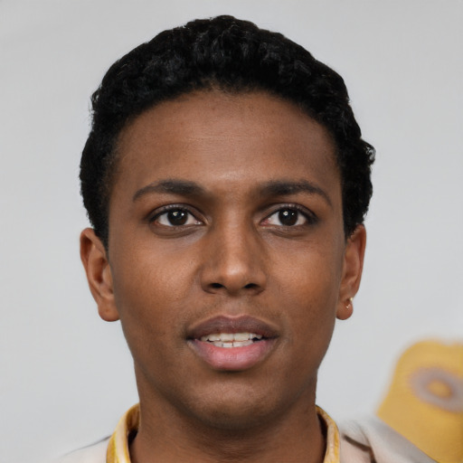 Neutral black young-adult male with short  black hair and brown eyes