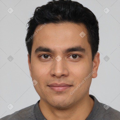 Joyful latino young-adult male with short  black hair and brown eyes