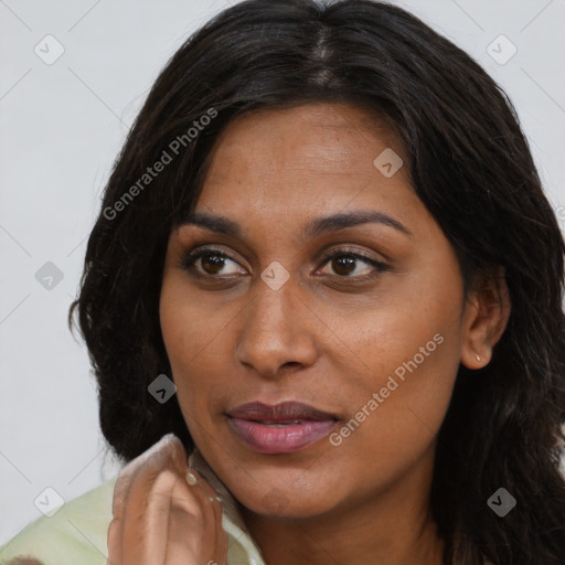 Joyful asian young-adult female with long  brown hair and brown eyes