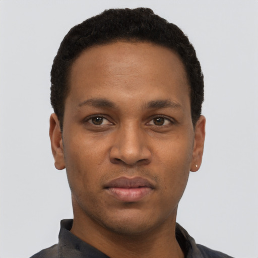 Neutral black young-adult male with short  black hair and brown eyes