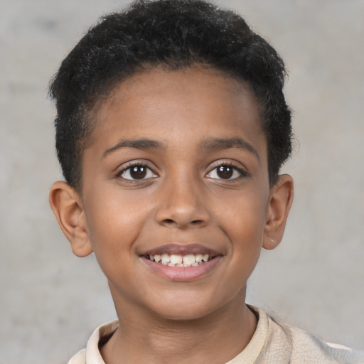 Joyful latino child female with short  brown hair and brown eyes