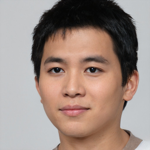 Neutral asian young-adult male with short  black hair and brown eyes