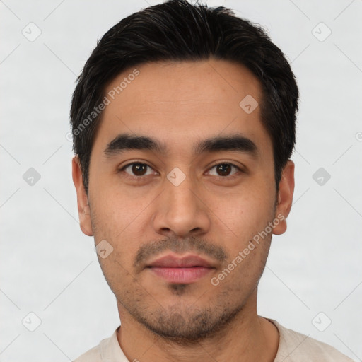 Neutral latino young-adult male with short  black hair and brown eyes