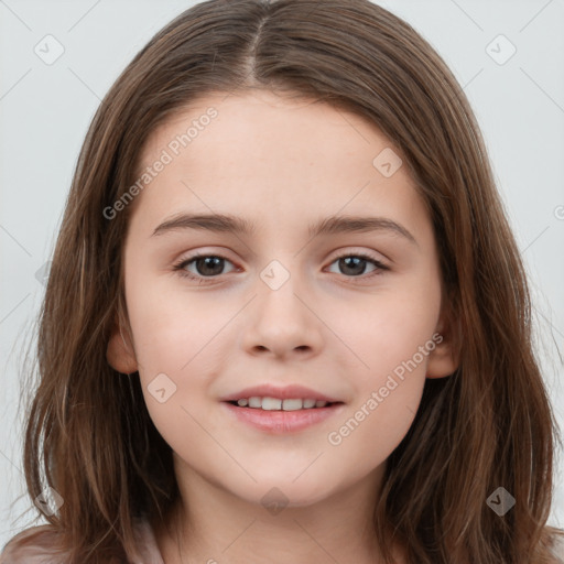 Joyful white child female with long  brown hair and brown eyes