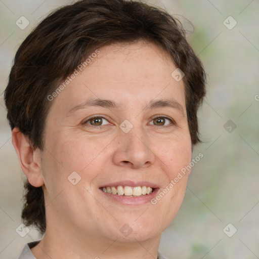 Joyful white adult female with short  brown hair and brown eyes