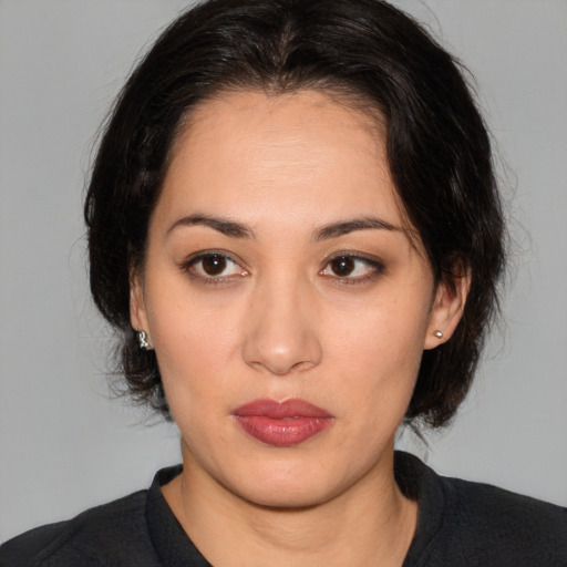 Neutral white young-adult female with medium  brown hair and brown eyes