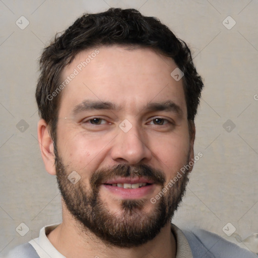 Joyful white young-adult male with short  black hair and brown eyes