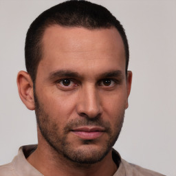 Neutral white young-adult male with short  brown hair and brown eyes