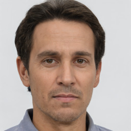 Neutral white adult male with short  brown hair and brown eyes