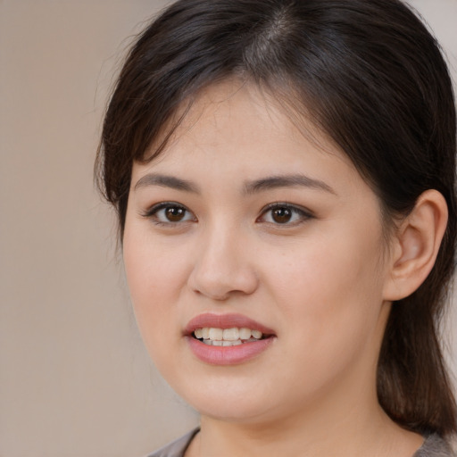 Joyful white young-adult female with medium  brown hair and brown eyes
