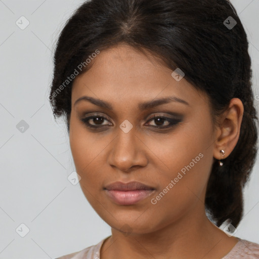 Joyful black young-adult female with medium  brown hair and brown eyes