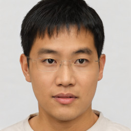 Neutral asian young-adult male with short  brown hair and brown eyes