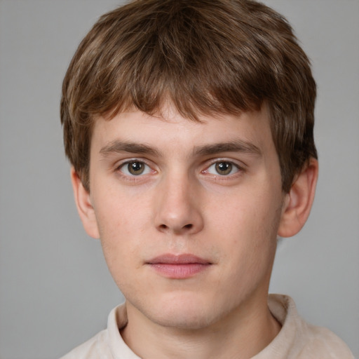 Neutral white young-adult male with short  brown hair and grey eyes