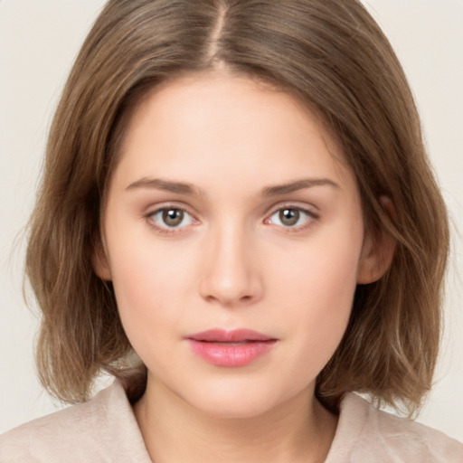 Neutral white young-adult female with medium  brown hair and brown eyes