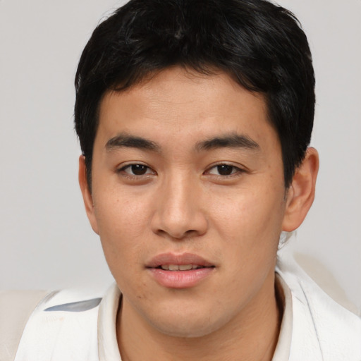 Neutral asian young-adult male with short  brown hair and brown eyes