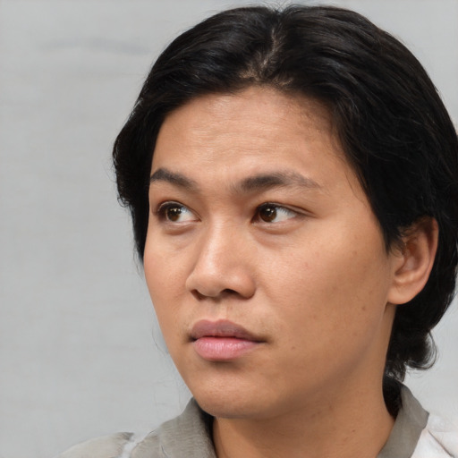 Neutral asian young-adult female with short  black hair and brown eyes