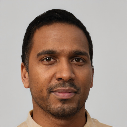 Neutral black young-adult male with short  brown hair and brown eyes