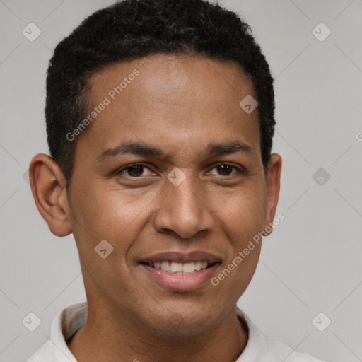 Joyful latino young-adult male with short  brown hair and brown eyes