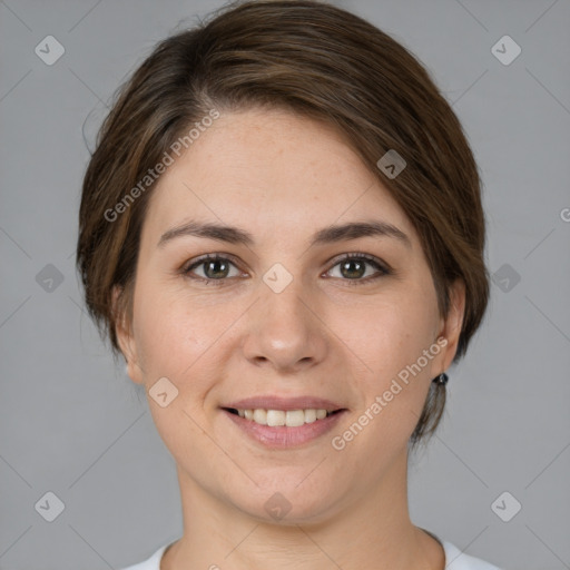 Joyful white young-adult female with medium  brown hair and brown eyes