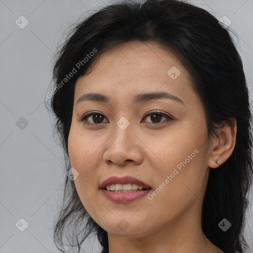 Joyful white adult female with medium  brown hair and brown eyes