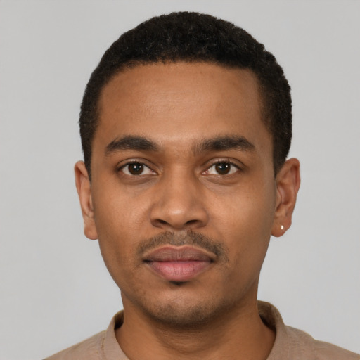Neutral black young-adult male with short  black hair and brown eyes