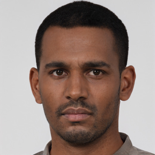 Neutral black young-adult male with short  black hair and brown eyes
