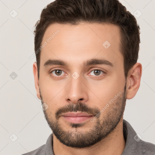 Neutral white young-adult male with short  brown hair and brown eyes