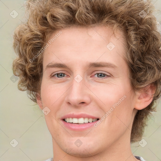 Joyful white young-adult female with medium  brown hair and green eyes