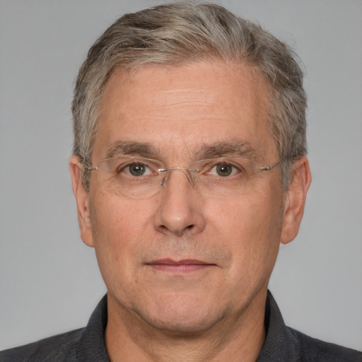 Neutral white middle-aged male with short  gray hair and brown eyes