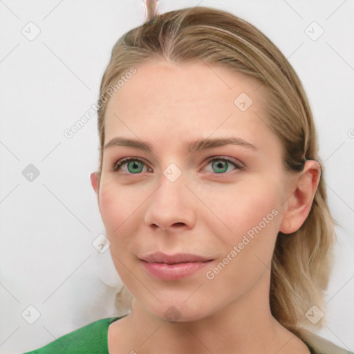 Joyful white young-adult female with medium  brown hair and green eyes