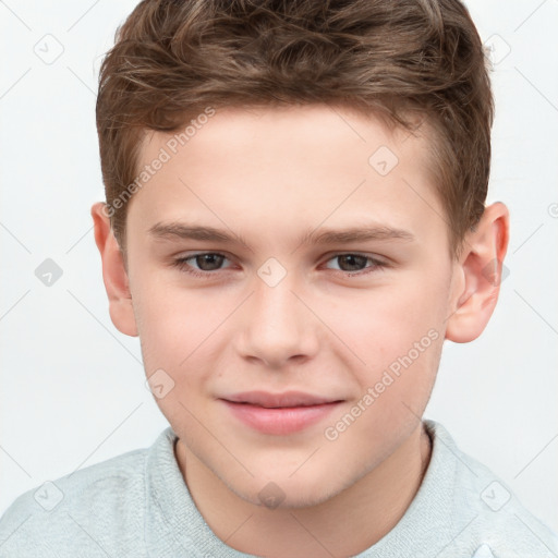 Joyful white child male with short  brown hair and brown eyes