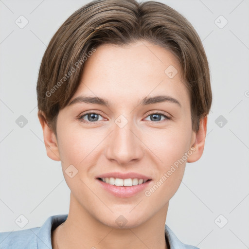 Joyful white young-adult female with short  brown hair and grey eyes