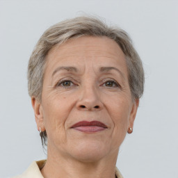 Joyful white middle-aged female with short  brown hair and brown eyes